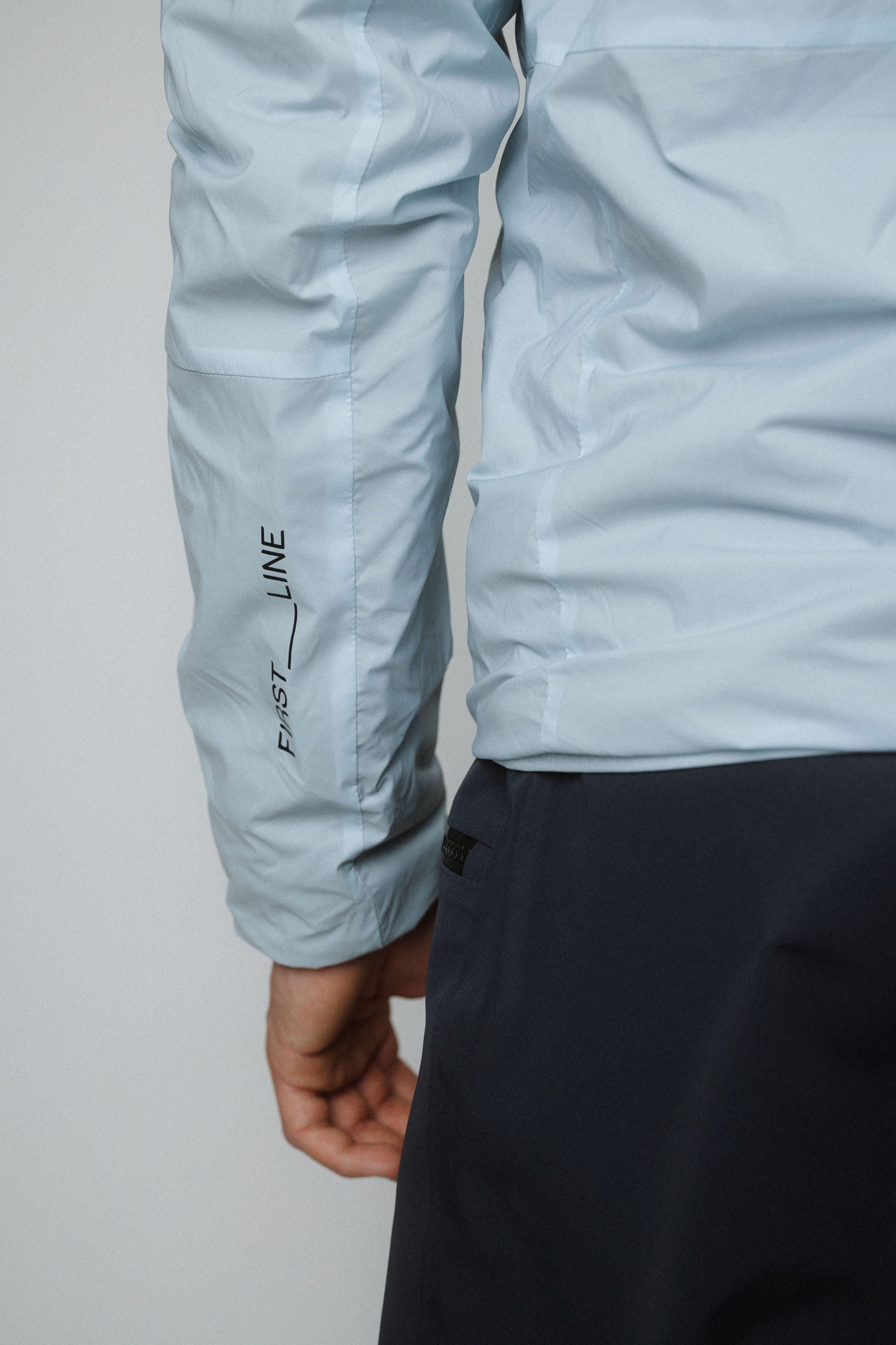 Bliss Hybridjacket Polartecalpha_men_ice blue_detail view back sleeve