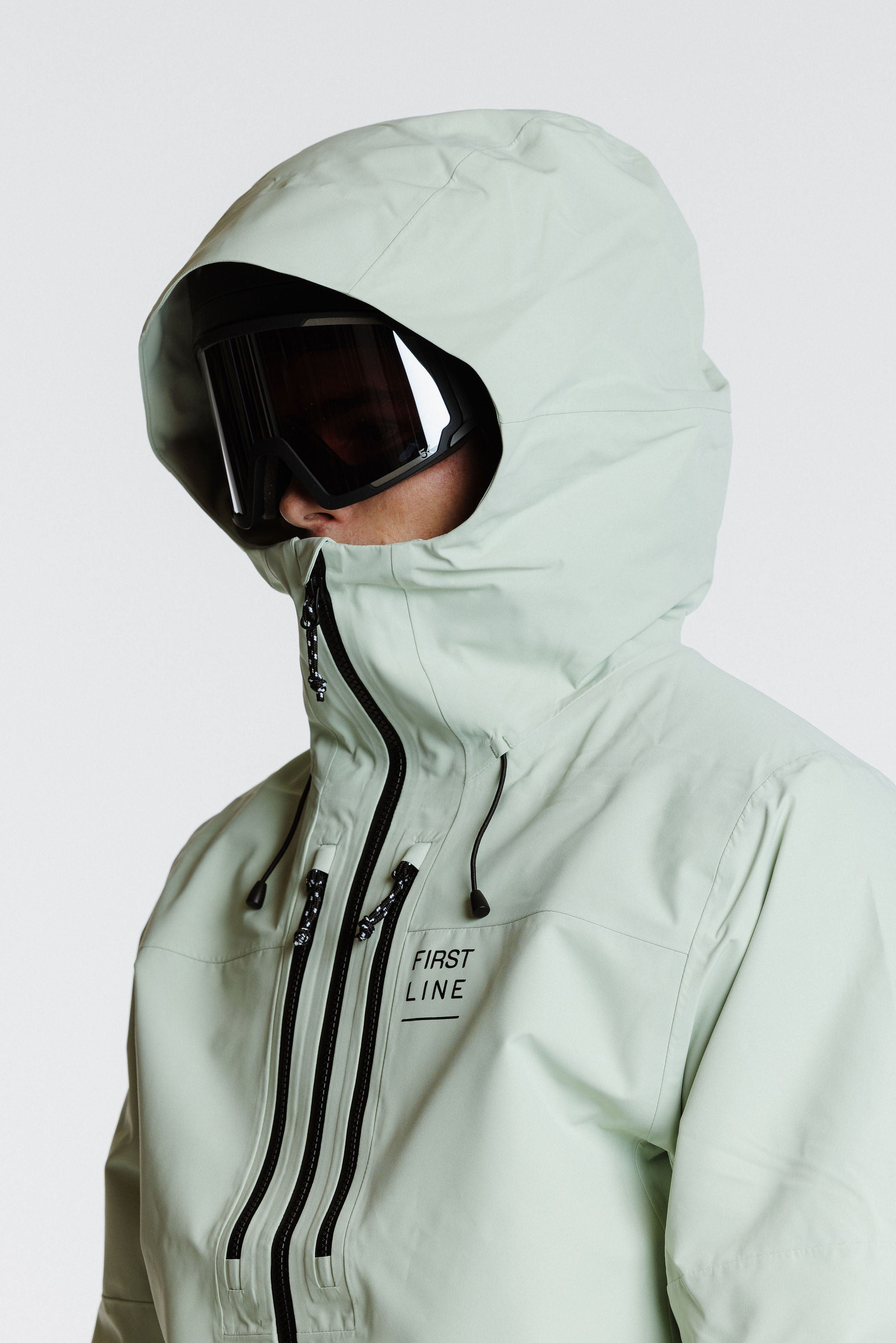 Enjo_3layershelljacket_men_softsage_hood_sideview