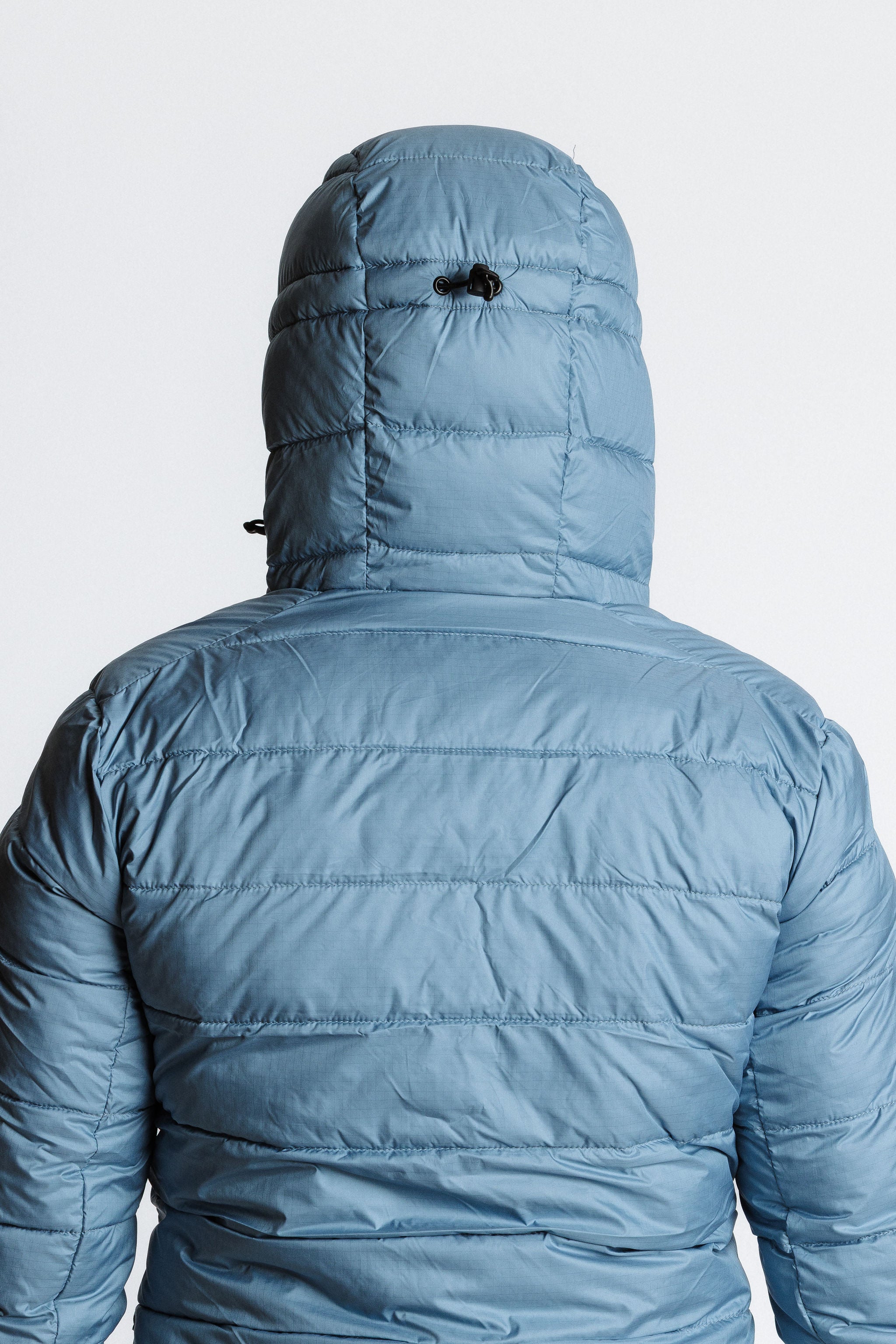 Komodinsulationjacket_women_dustyblue_hood_backview