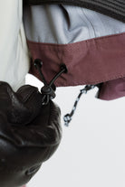 Enjo_3layershelljacket_men_cacaopowder_drawcordadjustment